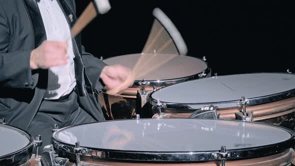 Musician Playing the Timpani