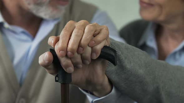 Old Couple Still Holding Hands, Going Through Joy and Troubles in Life Together