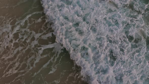 An Aerial View of Waves Crashing on Beach in Cancun