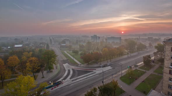 Sunrise Over Road Intersection with Reconstructed Tram Tracks Aerial Panoramic Timelapse