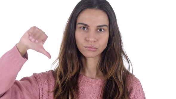 Thumbs Down By Young Latin Girl White Background