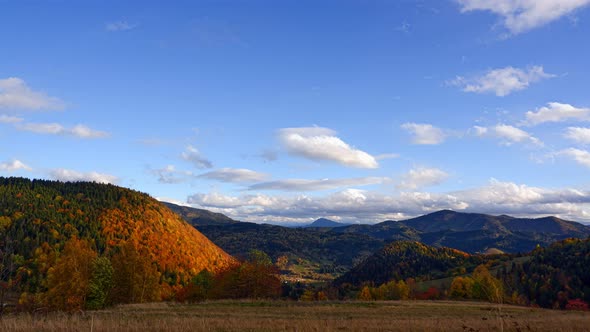 Beautiful autumn landscape, blue sky with clouds