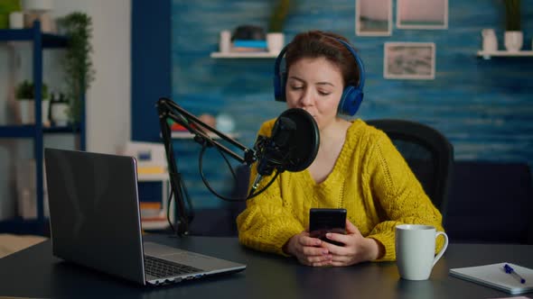 Influencer Using Laptop While Talking with Followers