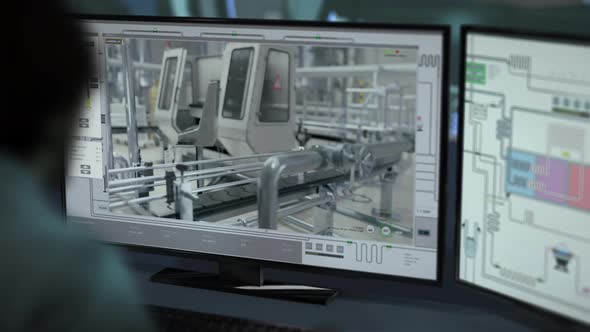 Technician Uses Advanced Tech Program To Control Automated Plant Machinery