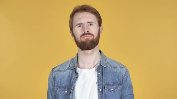 Sad Upset Redhead Man Yellow Background