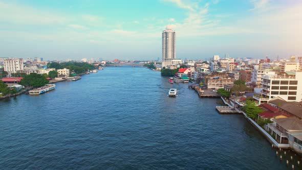 4K : Aerial view over Bangkok city and Chao phraya river. Cinematic drone shot.