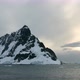 WS Lemaire Channel with snow covered mountain at sunset / Antarctica - VideoHive Item for Sale