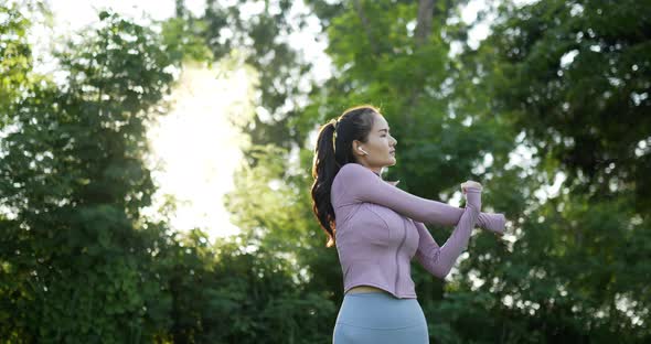 Woman warm up in the garden