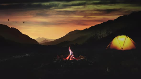 Hiking, camping, and a comfortable campfire with the sunset in the forest