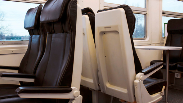 Empty Black Seats In Moving Express Train