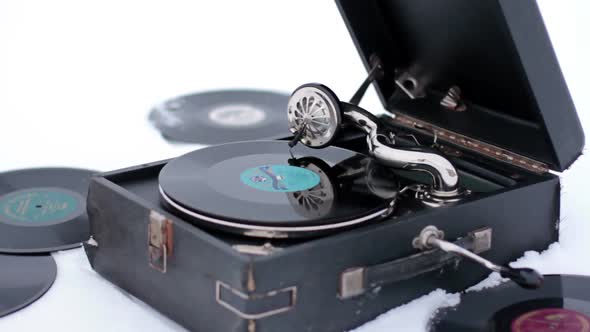 Old Gramophone Record Playing In The Snow