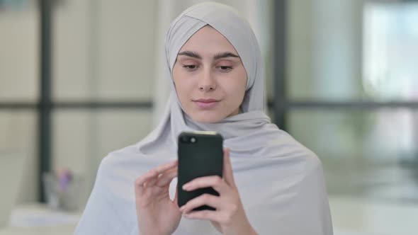 Young Arab Woman Using Smartphone