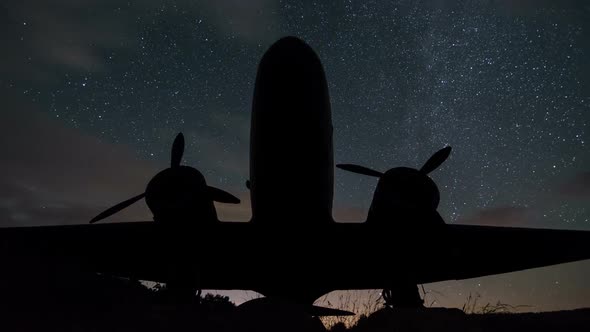 Stars Turning over Old Aircraft