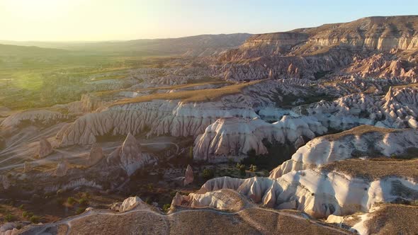 Hoodoos, Fairy Chimneys and Sedimentary Volcanic Rock Formations in Sunset Cappadocia Turkey