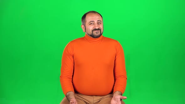 Caucasian Man Thinks Then Shrugs Disappointedly, No Idea. Green Screen. Slow Motion