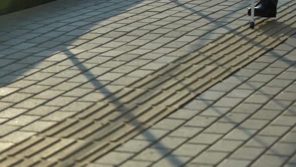 Man With Visual Problems Walking on Special Tactile Pavement Using Cane in City