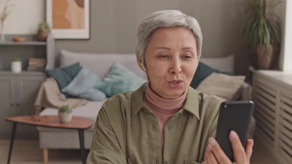 Senior Woman Videocalling via Smartphone