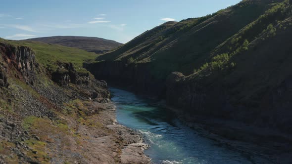 Birds Eye of Jokulsa Glacier River Flowing Through Two Canyon Lava Formation in Icelandic Landscape