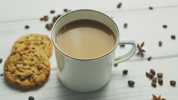 Mug with Coffee and Cookies