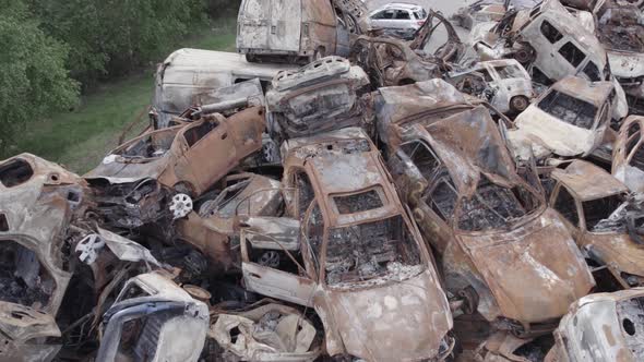 War in Ukraine a Dump of Burned Cars in Irpin Bucha District