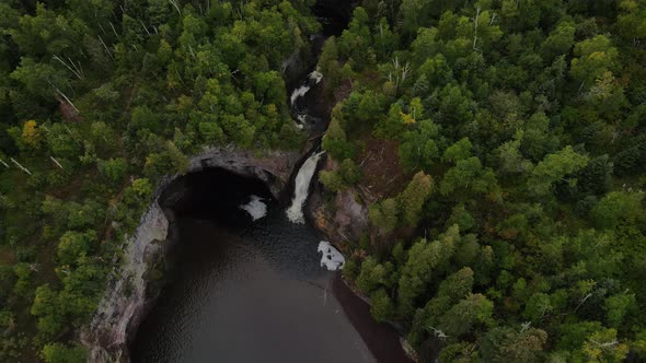 beautiful waterfall by lake superior on the north shore minnesota during late summer aerial view