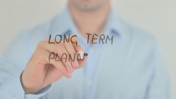 Long Term Planning, Man Writing on Transparent Glass Screen