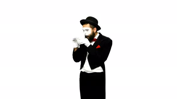 Funny Man Mime Counts Money and Hides It on White Background