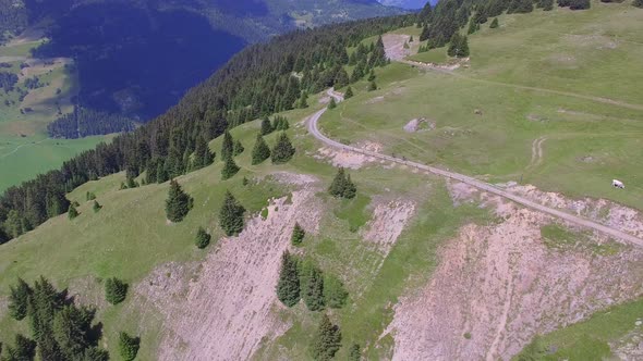 Aerial view of mountain bikers on a scenic singletrack trail