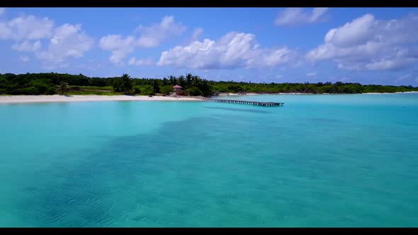 Aerial drone tourism of exotic island beach trip by blue green ocean and white sand background of a 