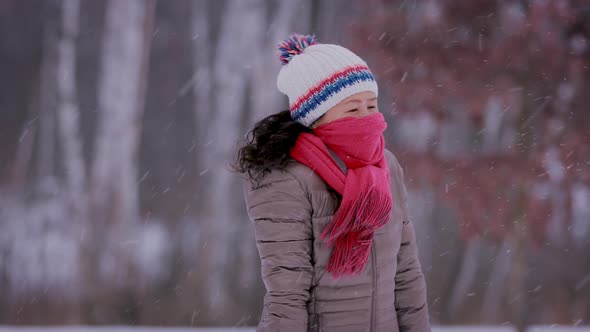 Asian Woman Freezing On Cold Day