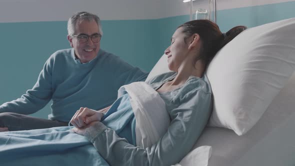 Man visiting her daughter at the hospital