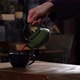 Cinematic Slow Motion Pouring Herbal Tea in Navy Blue Mug from Green Tea Pot - VideoHive Item for Sale