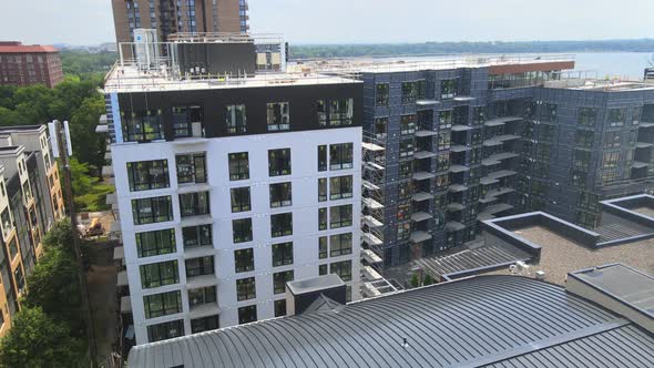 aerial view of a 8 floor hight building in construction with the exterior undone in south minneapoli