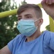 A Teenage Boy in a Medical Mask Is Engaged in Sports - VideoHive Item for Sale