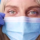 Close Up of 30s Female Doctor or Nurse Wear Blue Gloves Taking Off Face Mask to Breathe in Lab - VideoHive Item for Sale
