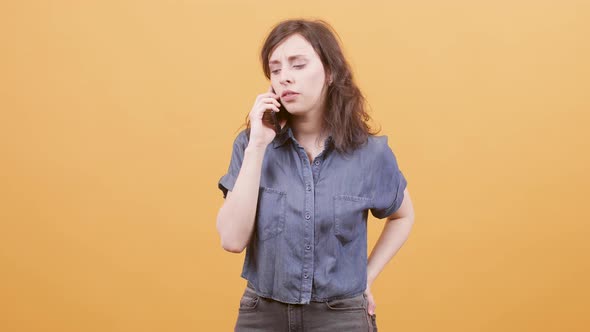 Confident Young Woman Talking on the Phone