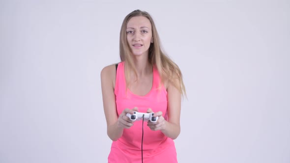 Portrait of Blonde Woman Playing Games