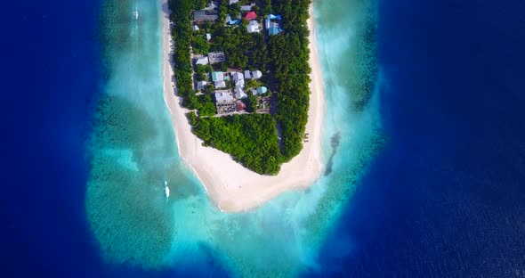 Luxury flying island view of a white paradise beach and aqua blue water background in colorful 4K