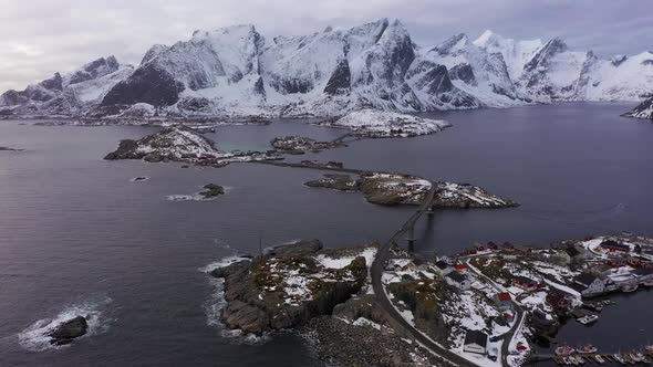 Hamnoy Village and Mountains in Winter. Lofoten Islands, Norway. Aerial View