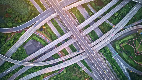 Aerial view from a drone flying over interchange and multi junction road.