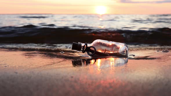 Message in a Bottle on the Coast at Sunset