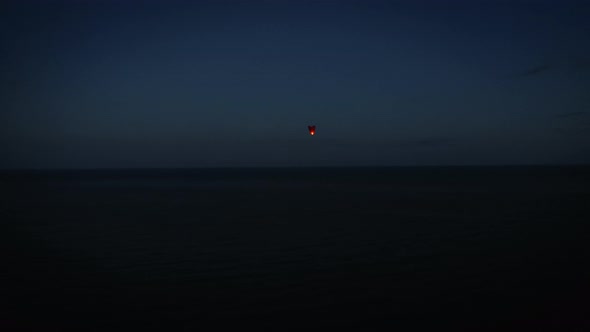 Chinese Lantern Flying In The Sky at Sunset Light