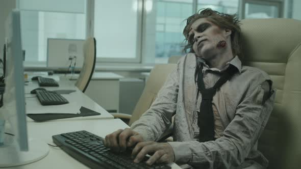 Zombie Businessman Working in Office
