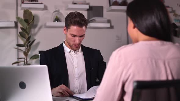 Job Interview Business Man Listens to Woman Candidate Answer