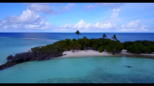 Aerial drone shot landscape of relaxing bay beach time by blue sea with white sand background of a d