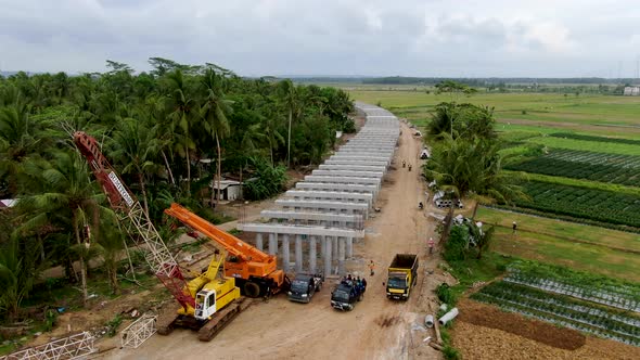 Work in progress for monorail road construction in Kulon Progo rural area, Yogyakarta in Indonesia.