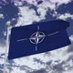 NATO Flag With Sky 4k - VideoHive Item for Sale