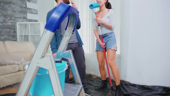 Joyful Couple Renovating