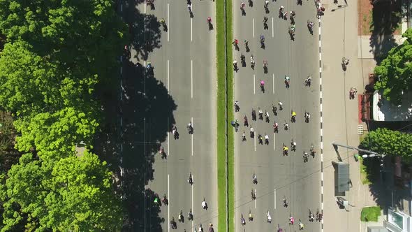 Group of Bikers during Cycle Race on City Roads