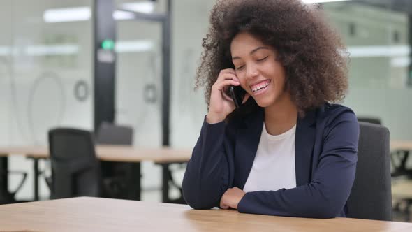 Young African Businesswoman Talking on Smartphone 